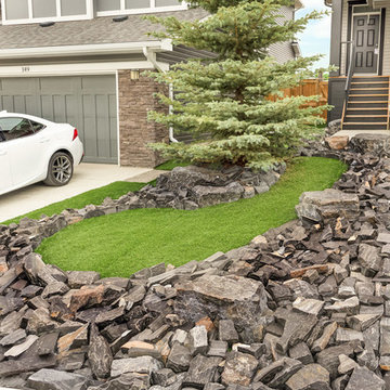 Front Yard with Rundle Stone Tailings & Synthetic Grass