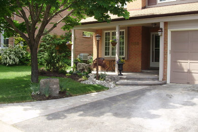 Photo of a small traditional landscaping in Toronto.