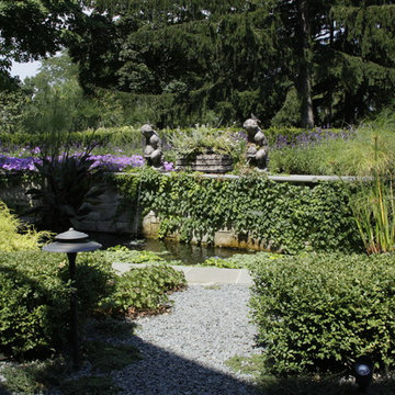 Full Landscape with Patio, Outdoor Kitchen, Stone Driveway and Planting