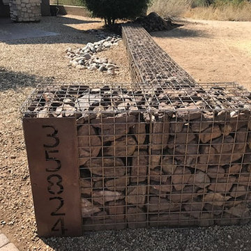 Gabion wall with house number