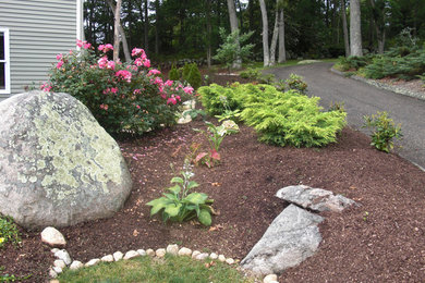 This is an example of a front yard mulch landscaping in Providence.