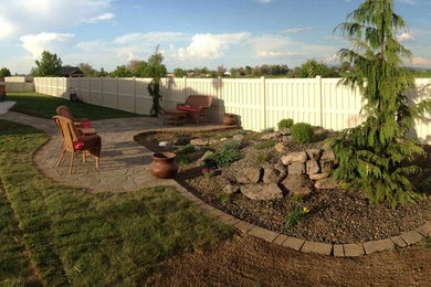 This is an example of a full sun backyard stone garden path in Other.