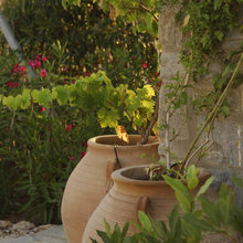 Urn planters for front courtyard and back garden