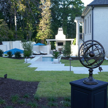 Garden focal point with Armillary on pedestal