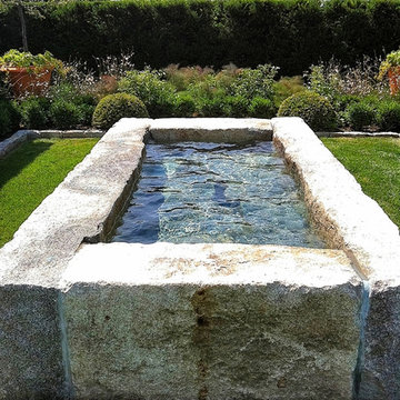 GARDEN: fountain with reclaimed natural granite basin