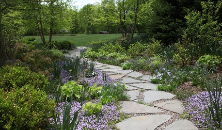 What to Know About Installing a Walkway of Pavers and Pebbles