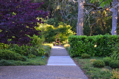 Inspiration for a huge contemporary partial sun front yard gravel landscaping in San Francisco for summer.