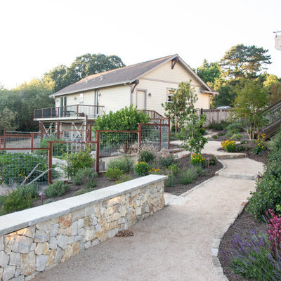 Design ideas for a large traditional full sun backyard gravel vegetable garden landscape in San Francisco.