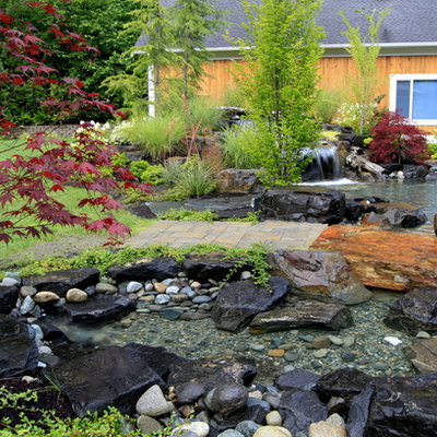 Design ideas for a traditional water fountain landscape in Seattle.