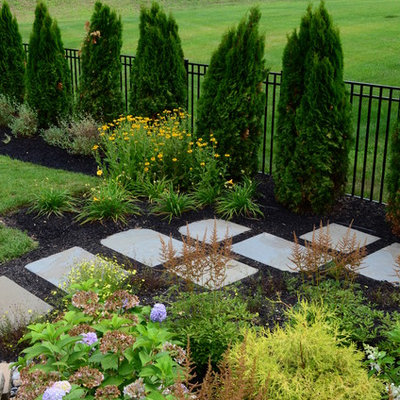 Photo of a traditional backyard stone garden path in Philadelphia.