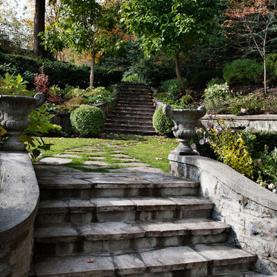 Inspiration for a traditional hillside stone landscaping in Montreal.