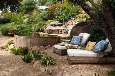 Inspiration for a large transitional full sun backyard gravel landscaping in Santa Barbara.