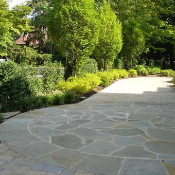 Graceful Flagstone Driveway Lined with Ornamental Grasses