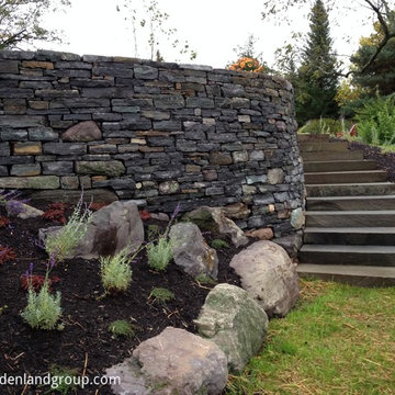 granite stone retaining wall and slab steps