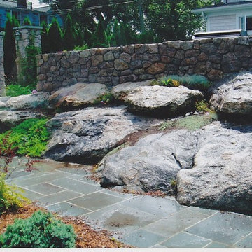 Granite stone walls and rock garden