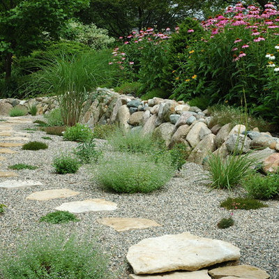 Photo of a contemporary retaining wall landscape in Detroit.