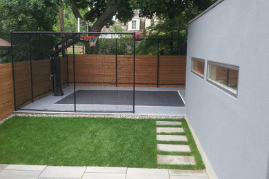 Design ideas for a small contemporary shade backyard concrete paver landscaping in Toronto for summer.