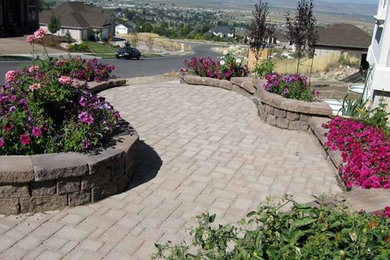 Design ideas for a traditional stone landscaping in Salt Lake City.