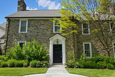 Inspiration for a large traditional full sun front yard stone walkway in Philadelphia for summer.