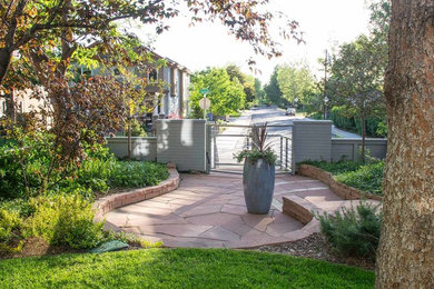 Design ideas for a small contemporary partial sun front yard stone landscaping in Denver for fall.