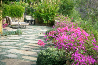 Photo of a mid-sized mediterranean full sun stone garden path in Santa Barbara for summer.
