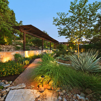 Inspiration for a rustic landscaping in Austin.