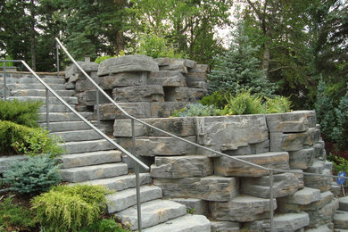 Design ideas for a traditional landscaping in Calgary.
