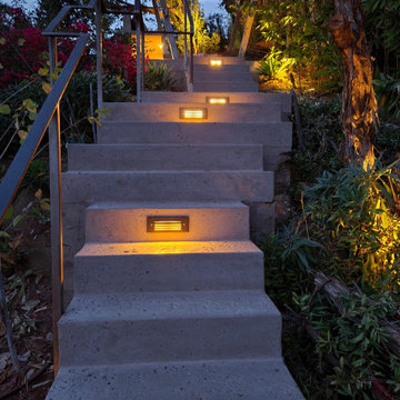 Hillside stair with custom rail and lighting