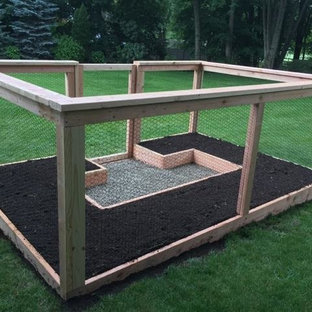 Mid-sized country backyard full sun formal garden in New York with a vegetable garden.