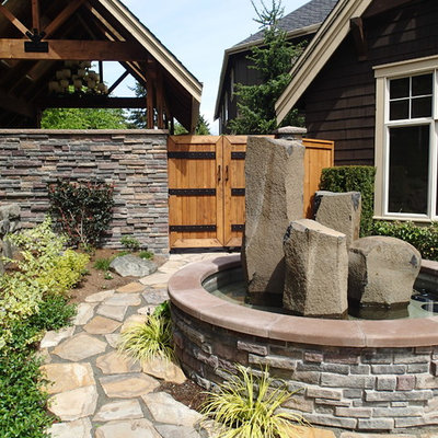 Design ideas for a traditional water fountain landscape in Seattle.