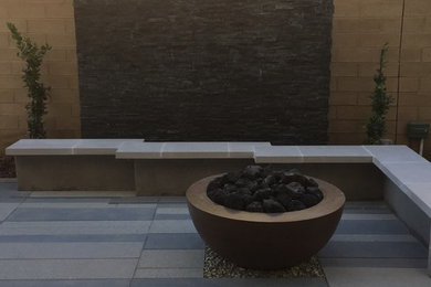 Photo of a medium sized contemporary back garden in Orange County with concrete paving.