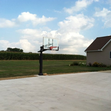 Janelle D's Pro Dunk Silver Basketball System on a 30x60 in Leesburg, IN