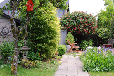 This is an example of an eclectic garden in Vancouver.