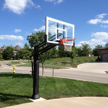 Jim G's Pro Dunk Gold Basketball System on a 25x45 in Lee's Summit, MO