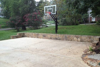 Design ideas for a large classic back garden in Houston with an outdoor sport court.