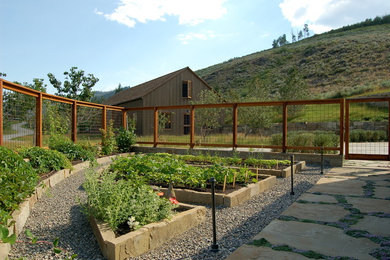 Design ideas for a farmhouse full sun gravel vegetable garden landscape in San Francisco.