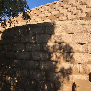 Keystone retaining walls and steps providing access to lower yard