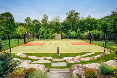 Inspiration for a large traditional full sun courtyard stone outdoor sport court in Baltimore.