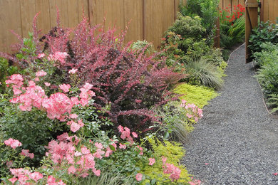 Inspiration for a mid-sized craftsman partial sun backyard decomposed granite garden path in Seattle for spring.