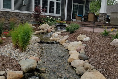 This is an example of a craftsman landscaping in Other.