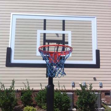 Kris W's Pro Dunk Gold Basketball System on a 45x31 in Apex, NC