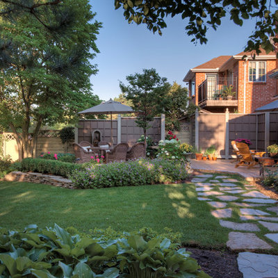 Photo of a traditional backyard landscaping in Toronto.