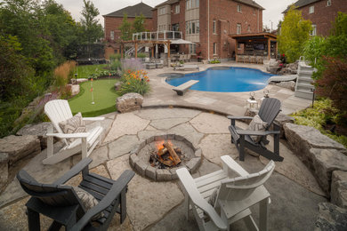 Design ideas for a transitional landscaping in Toronto.