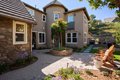 This is an example of a large transitional courtyard landscaping.