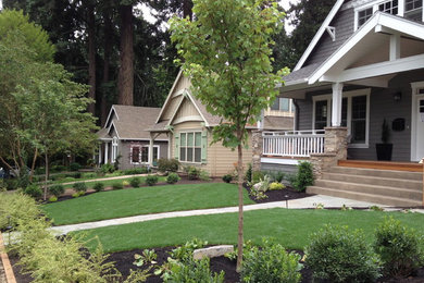 Design ideas for a craftsman full sun front yard concrete paver landscaping in Portland.