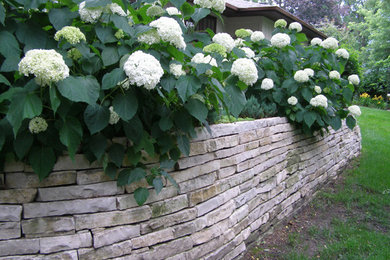 Photo of a large full sun stone landscaping in Chicago.