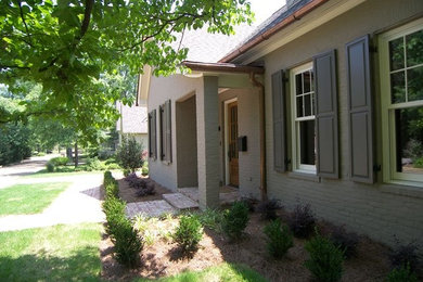 Photo of a mid-sized shade front yard mulch landscaping in Other.