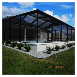 Landscape using rock around the pool cage - Traditional - Landscape ...