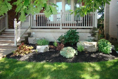 This is an example of a small shade front yard landscaping in Toronto.