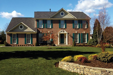 Inspiration for a mid-sized full sun front yard stone landscaping in Nashville.